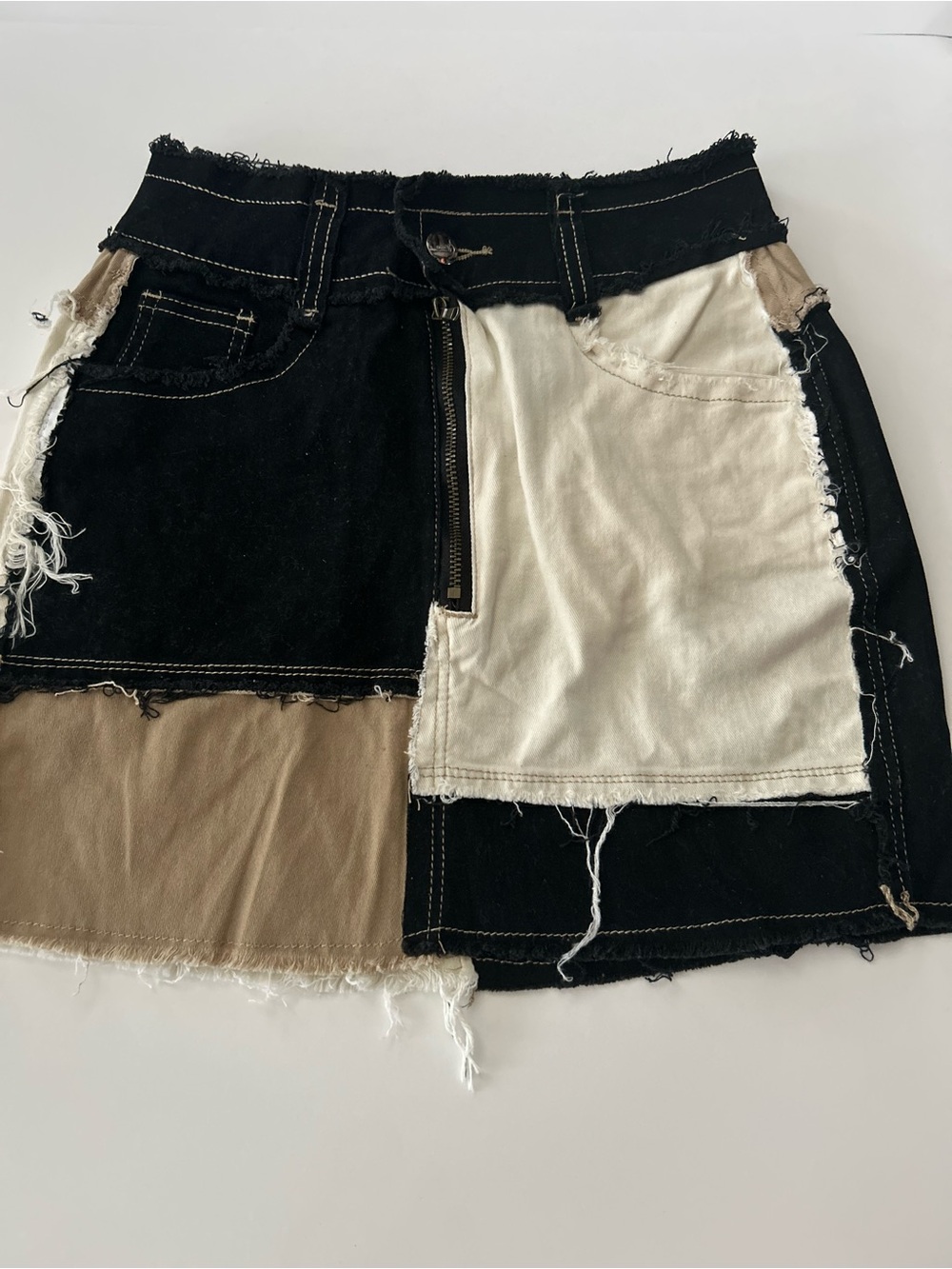 Jeans Brand Patchwork Mini Skirt in Black, Cream & Tan